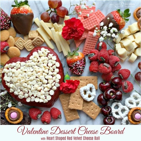 picture of cheese board with text "Valentine Dessert Cheese Board with heart shaped red velvet cheese ball"