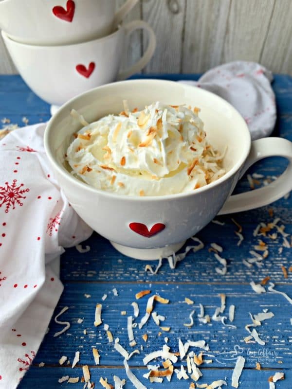 Coconut Mug Cake topped with toasted coconut