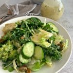 Green Salad with Lemon Thyme Vinaigrette on a white plate
