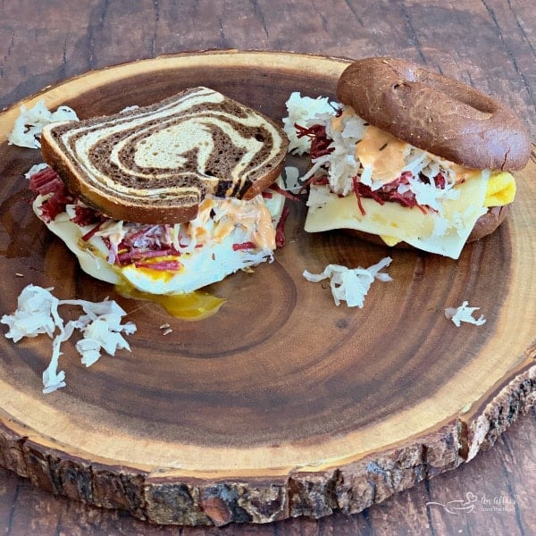 Reuben Breakfast Sandwiches Two Ways on a wood plank