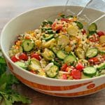 Greek Cauliflower Rice Salad with Brussels Sprouts in a salad bowl