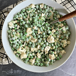 Overhead of Pea Salad with Cauliflower in a white serving bowl