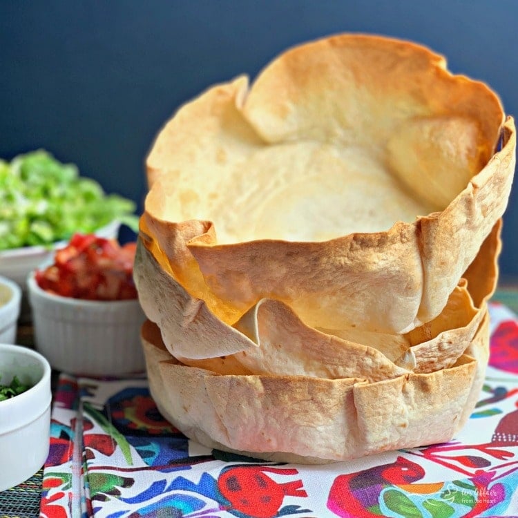 Air Fryer Taco Salad Bowls stacked close up