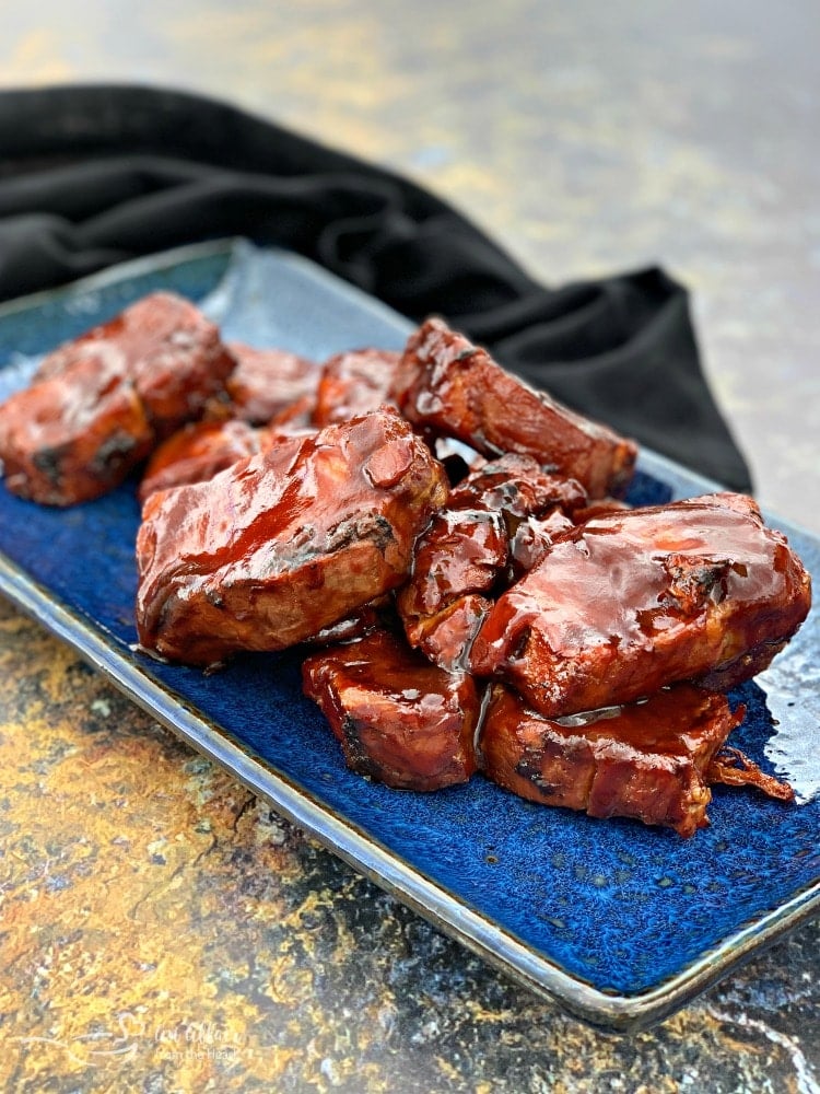 Instant Pot Dr. Pepper BBQ Pork Ribs plated on a blue plate