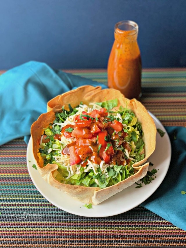 Taco Salads with Dorothy Lynch Taco Sauce in a homemade Taco Bowl