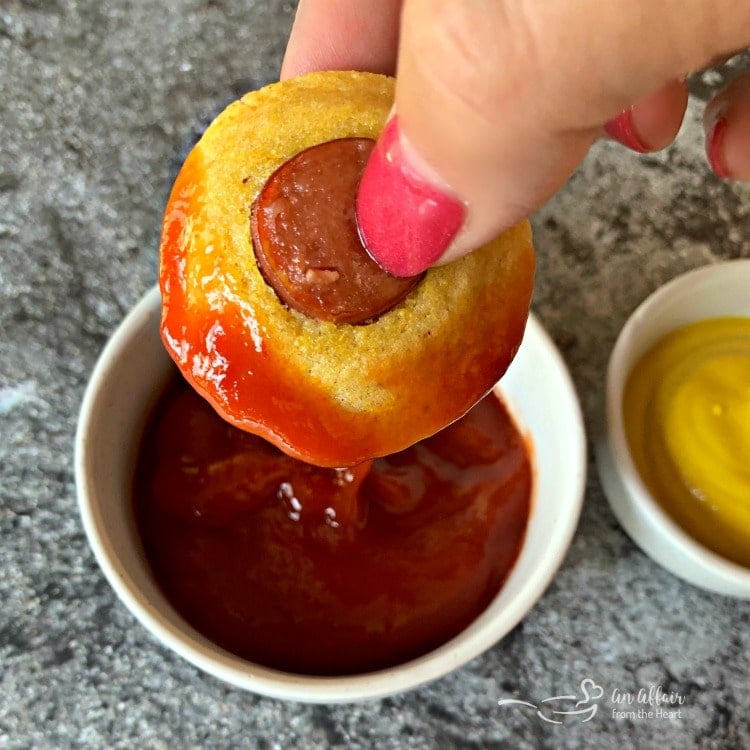 Corn Dog Mini Muffins dipped in ketchup