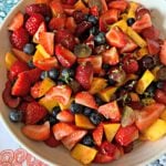 overhead of Summer Fruit Salad with Honey Lime Poppy Seed Dressing with zest
