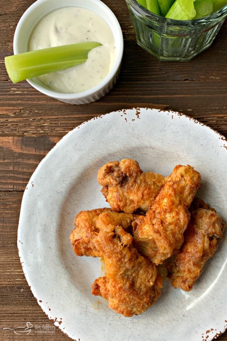 Overhead of Copy Cat Hooters Wings on a white plate