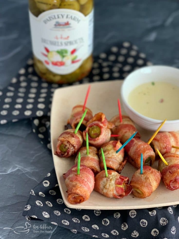 Bacon Wrapped Hot Brussels Sprouts Paisley farm with cheese sauce