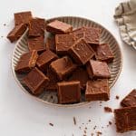 Close up of Never Fail Fudge pieces on a serving plate.