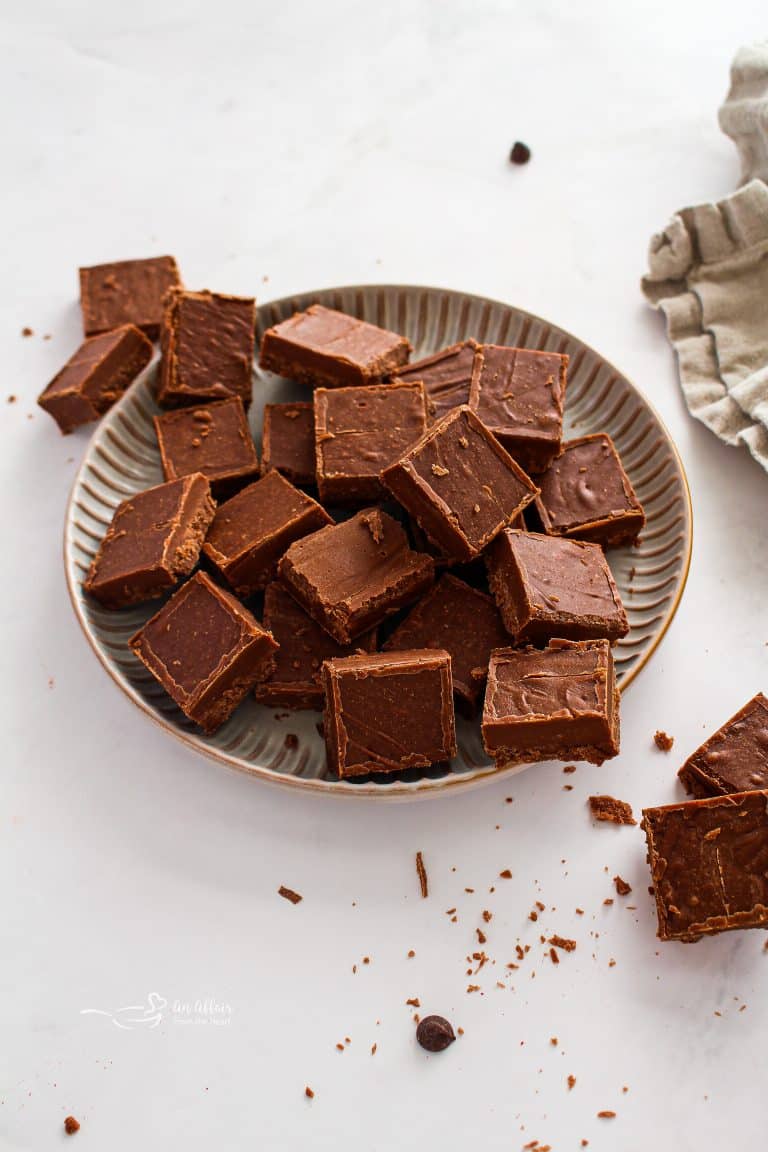 Close up of Never Fail Fudge pieces on a serving plate.