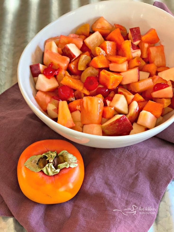 Persimmon Salad in a white bowl