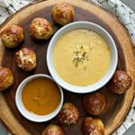 Top view Appetizer recipe Sausage Pretzel Bombs with Mustard Cheese Sauce