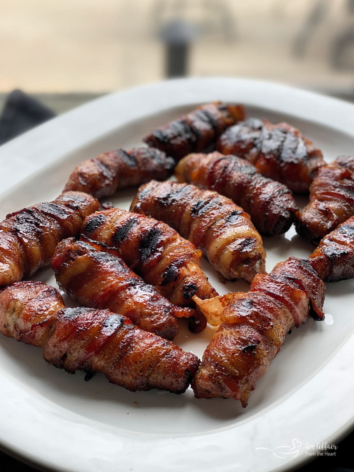 Moist and Tender Sweet & Spicy Bacon Wrapped Pork Ribs