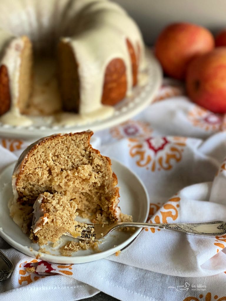 Caramel Apple Tea Cake sliced with a bite on fork