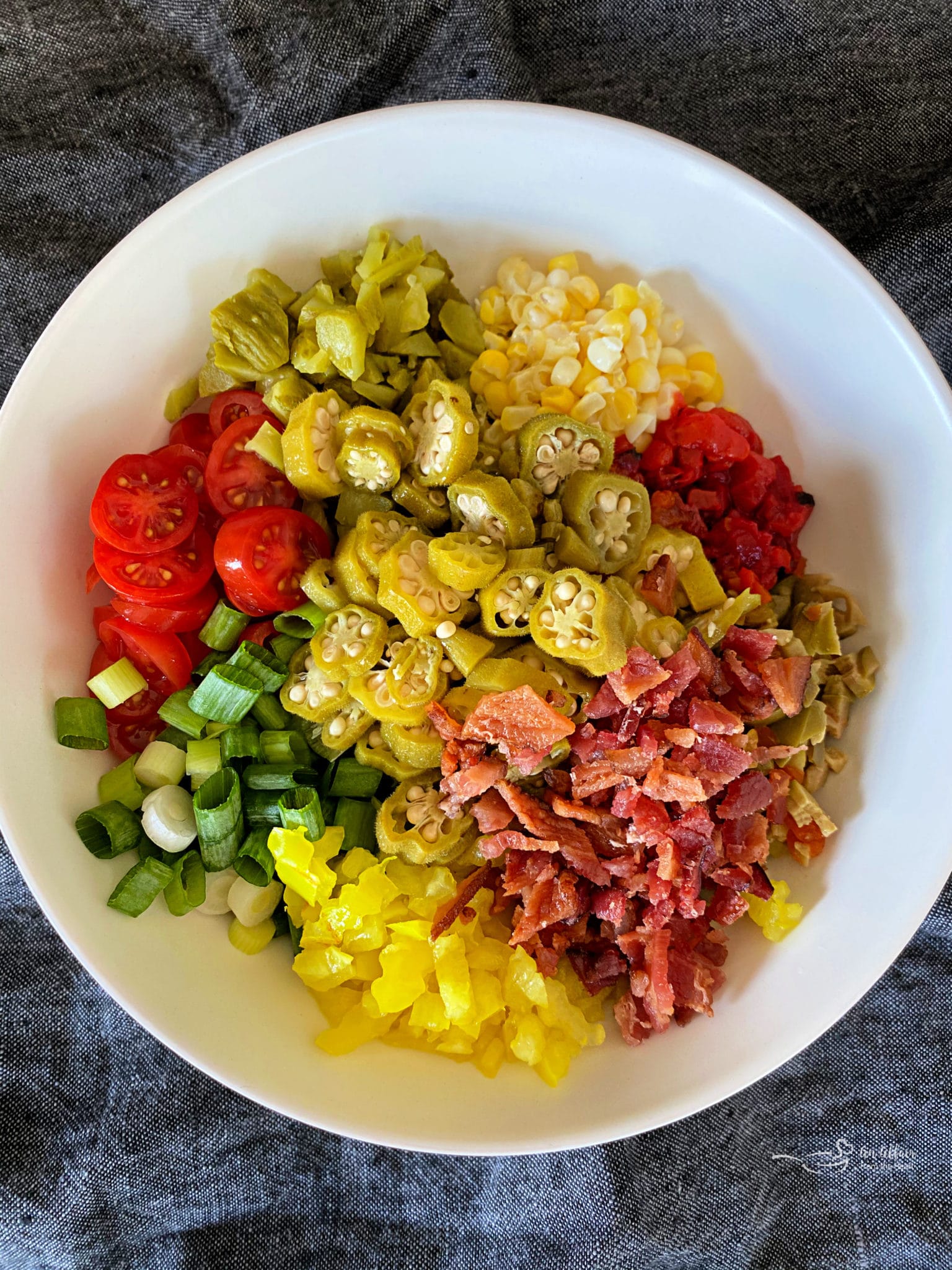 Pickled Okra Relish Bacon, pickled veggies, fresh tomatoes & corn