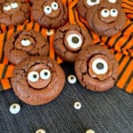 Halloween Chocolate Sugar cookies on orange and black towel with eyes