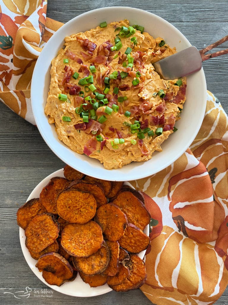 Savory Pumpkin Dip with Bacon full of cheese and a little bit of a ...