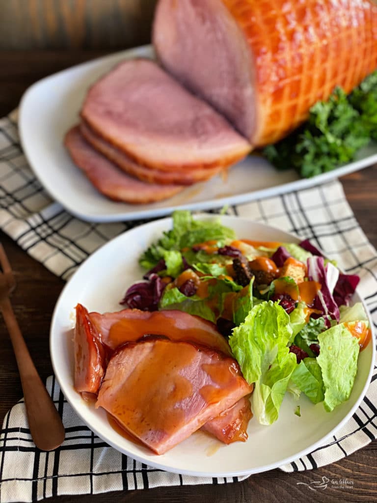 Dorothy's Slow Cooker Glazed Ham - plated with salad