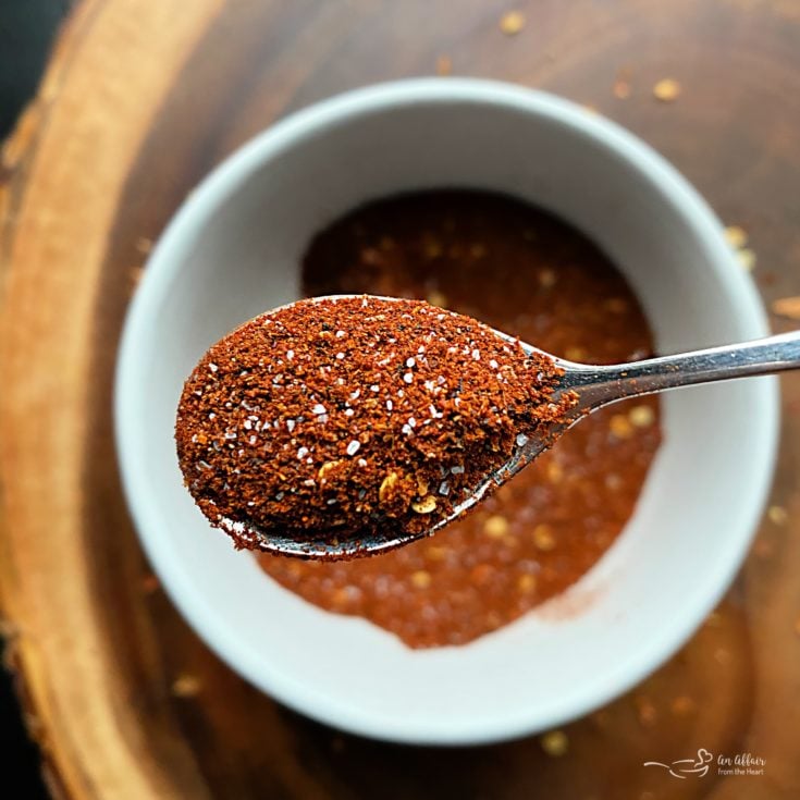 Homemade Chili Seasoning in white bowl with spoonful
