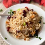 Rice Pilaf with Cranberries and Almonds white bowl