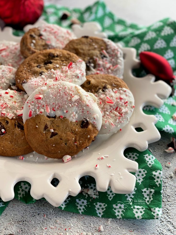 Peppermint Dipped Chocolate Chip Cookies on snowflake plate