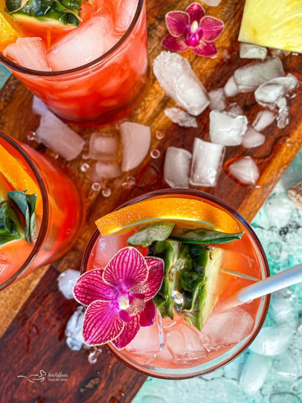 Tropical Sparkling Cocktails on wooden background