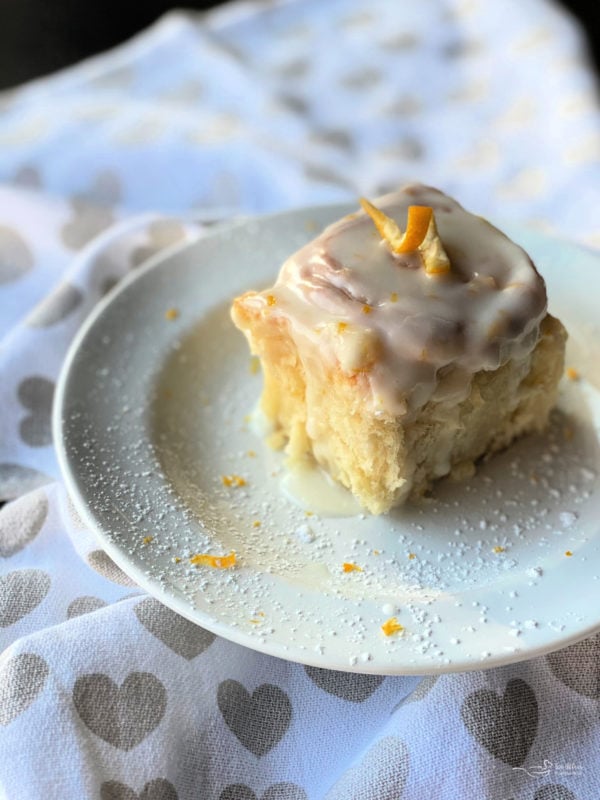 View of lemon sweet roll on white plate