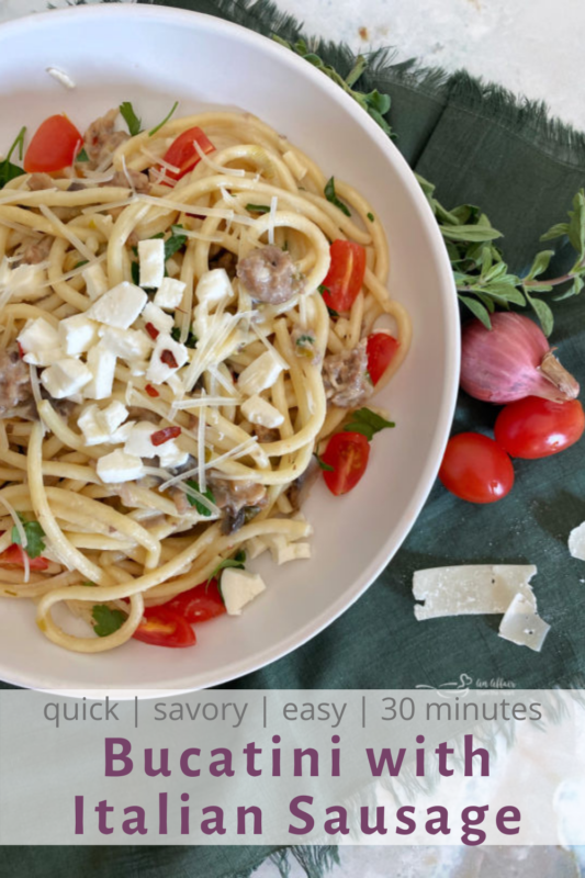 Top view of Italian sausage with bucatini on plate for Pinterest