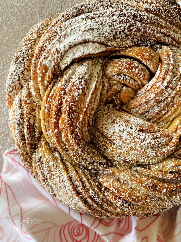 Top view of Russian rose bread with powdered sugar