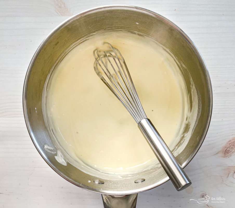 Top view of cheese sauce for garlic cheese asparagus