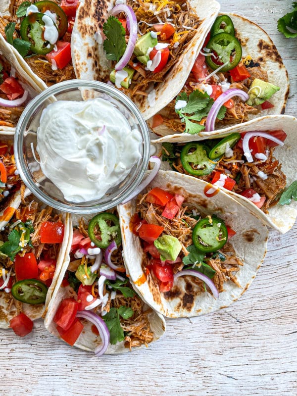 Top view of tacos filled with slow cooker cilantro lime pork