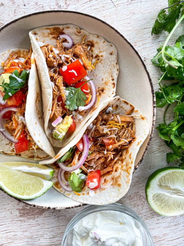 three tortillas stuffed with cilantro lime pork