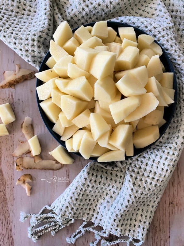 Top view of cubed potatoes in bowl