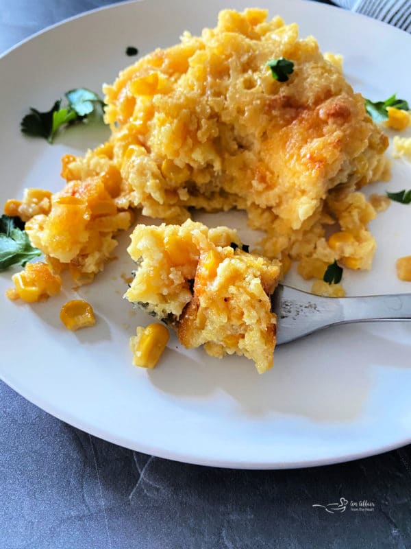 Front view of corn pie pudding with fork