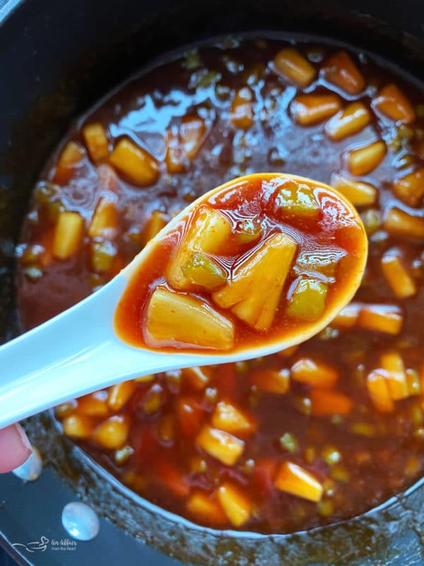 bowl of pineapple sauce in spoon