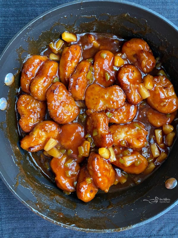 sweet & sour chicken cooking in pan