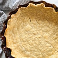 pie crust in brown pie plate