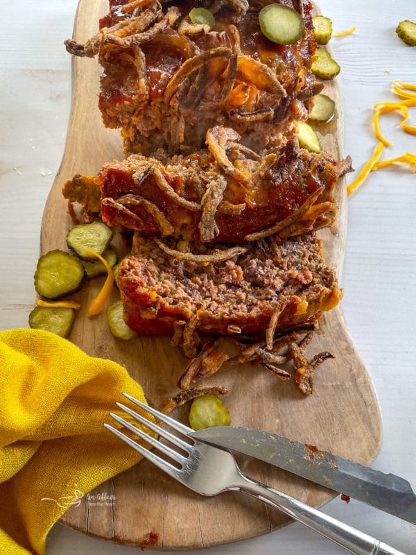 slices of cheeseburger meatloaf on wood