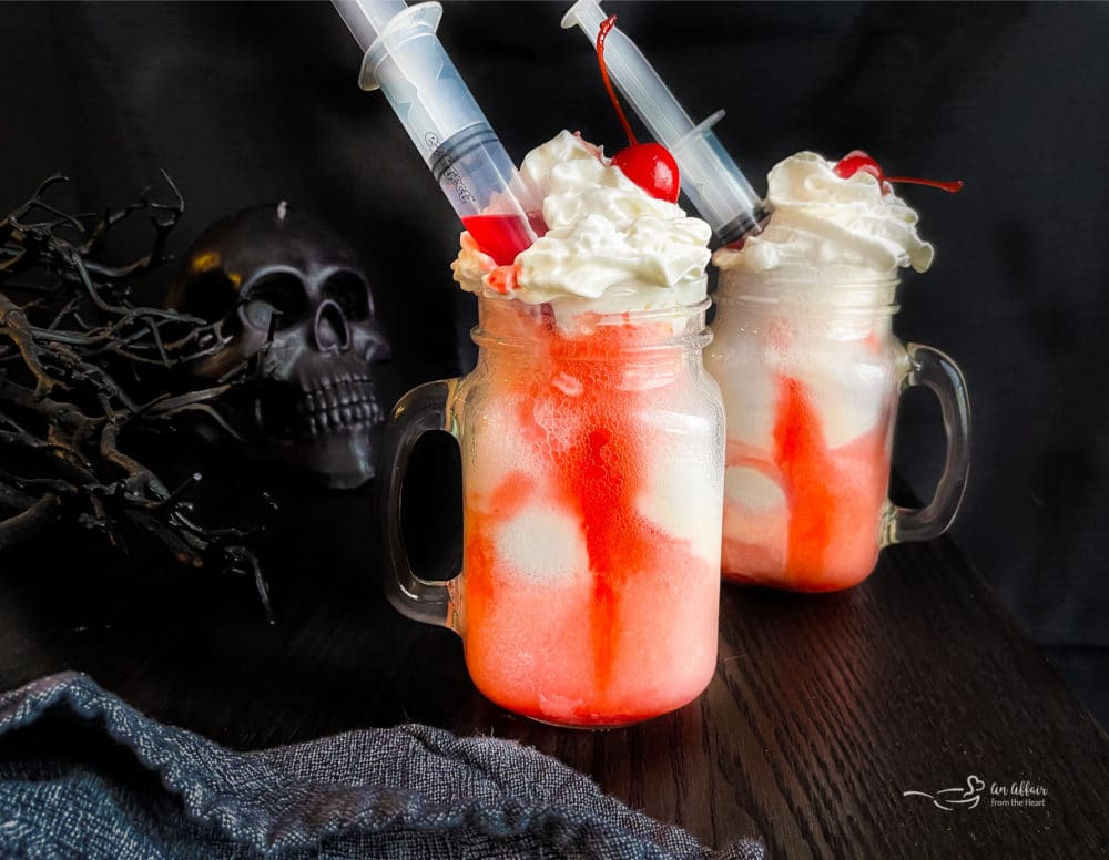 two bloody dirty shirley float with a syringe close up