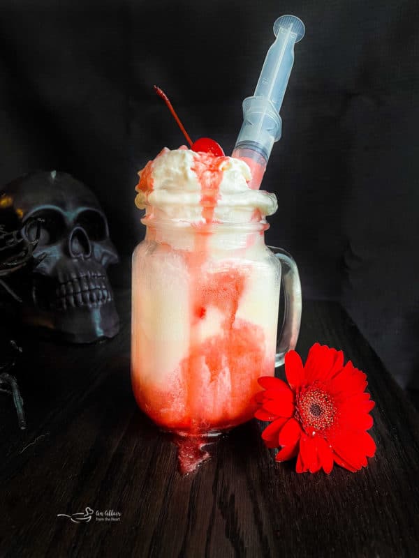 bloody dirty shirley float with a syringe