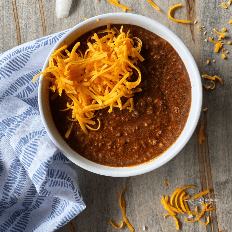 bowl of chili with cheese on top