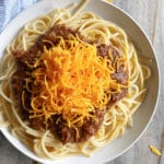 Cincinnati Chili over spaghetti white plate