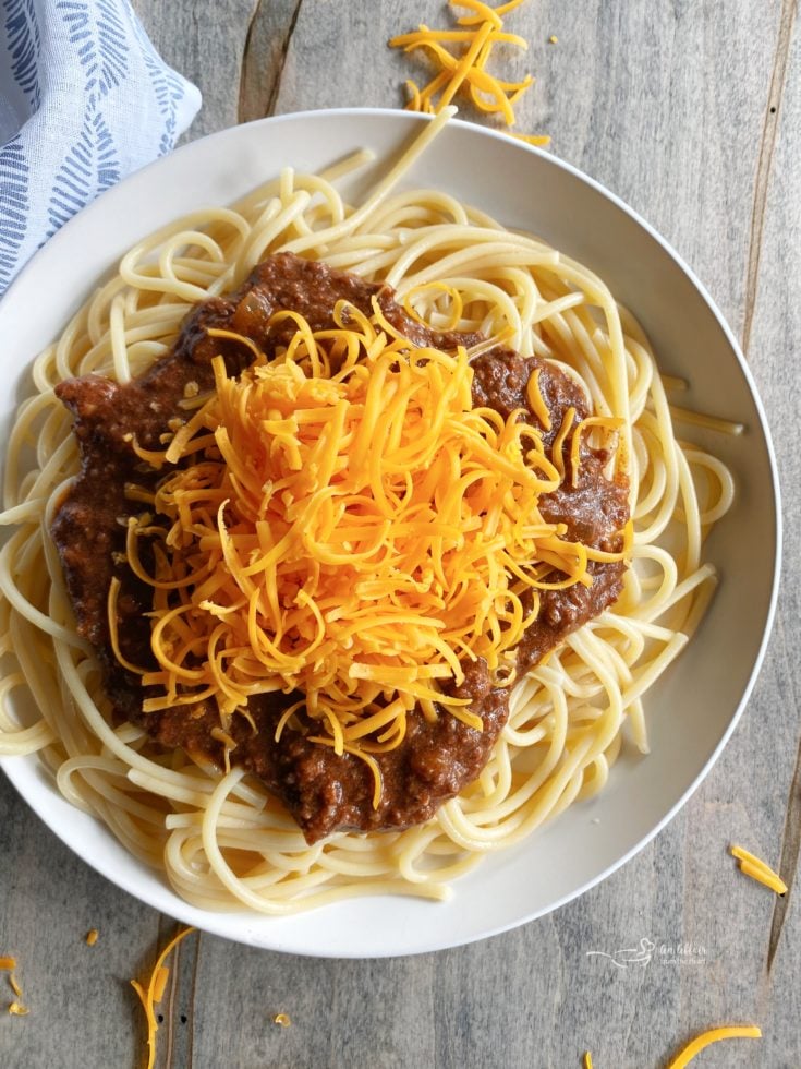 Cincinnati Chili over spaghetti white plate