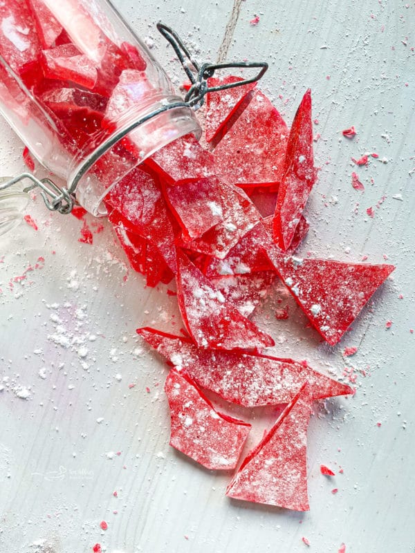 cinnamon rock candy spilling out of container