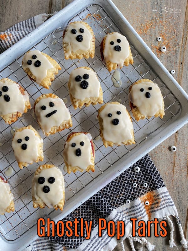 adding the eyes and mouth to ghost pop tarts