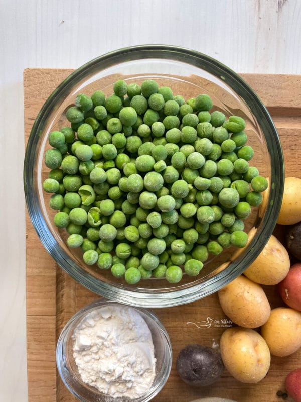 one bowl of peas with potatoes