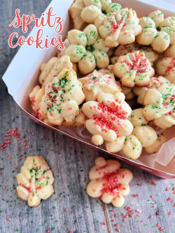 one box filled with spritz cookies with text