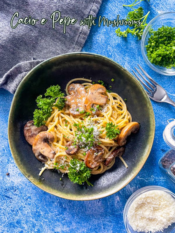 one bowl of cacio e pepe with mushrooms and parsley