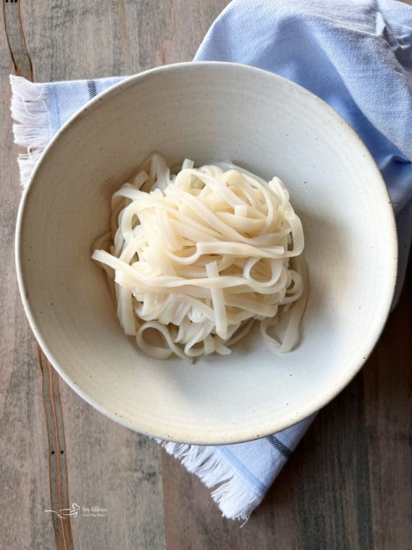 white bowl with noodles 